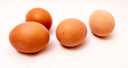 4 eggs on white background.