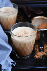 Carob Drink, Cocoa or Coffee Milk Drink on dark background