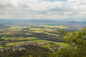 Fototapeta na wymiar View from the hill of Ljubljana city, capital of Slovenia, and its neighborhood.