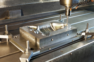 Industrial metal mold/blank milling. CNC technology and metal en