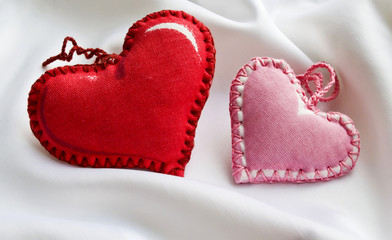 textile Valentine on white silk fabric