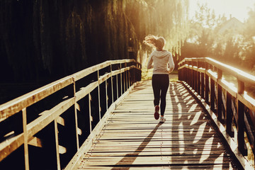 Female jogger exercising outdoors