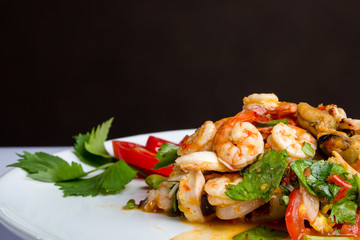 Spicy shrimp, mussel, squid salad hot and sour. Thai food.