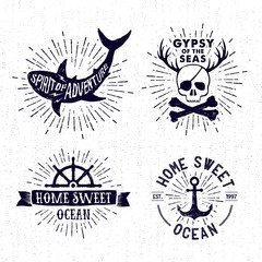 Hand drawn vintage set of badges with pirate skull, shark, anchor