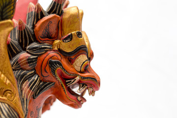 Wood Asian dragon on a white background
