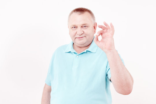 Senior showing okay sign