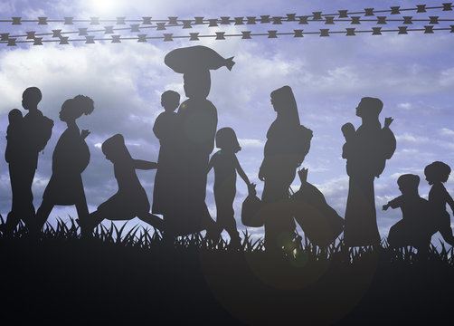 Flüchtliinge - Frauen und Kinder am Grenzaun 