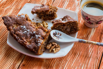 Banana pie with walnuts and coffee