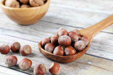 Nuts in a wooden spoon
