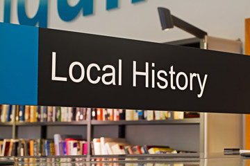 Local History section sign inside a modern public library