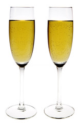 Two champagne flutes on white background. Clipping path incl.