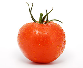 Ripe tomato covered by drops of water on white background. Clipping path incl.