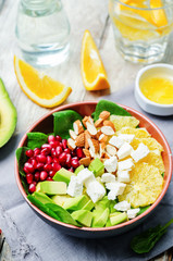 Spinach feta avocado pomegranate orange almond salad with orange