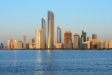 Fototapeta na wymiar Abu Dhabi cityline at sunset