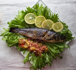 Fish baked sea bass with citrus sauce