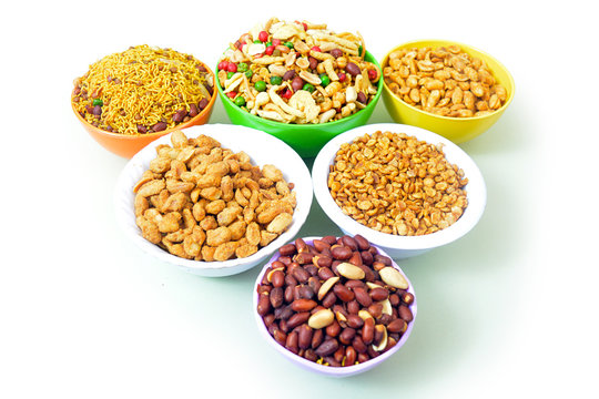 Peanut, chole and mix nimko in bowl isolated on white background