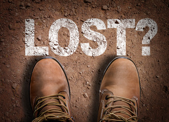 Top View of Boot on the trail with the text: Lost?