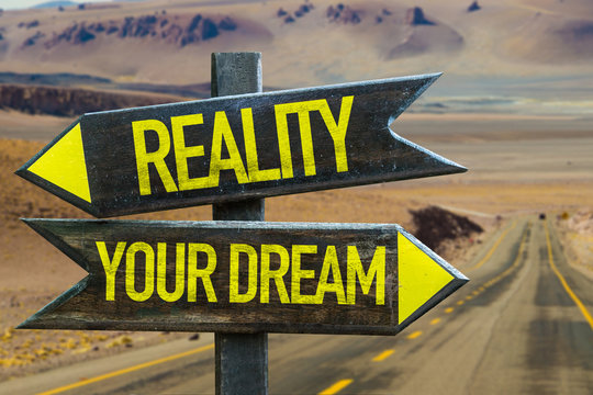 Reality - Your Dream signpost in a desert road