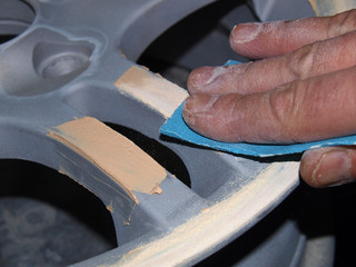 sanding of putty on car wheels