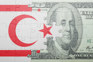 puzzle with the national flag of northern cyprus and dollar banknote