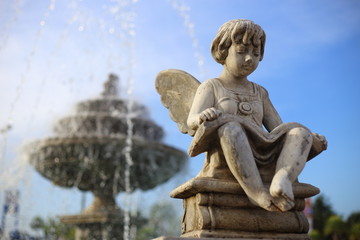 Baby Angel sculpture with a fountain