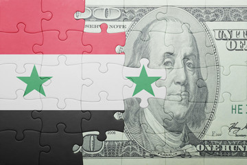 puzzle with the national flag of syria and dollar banknote