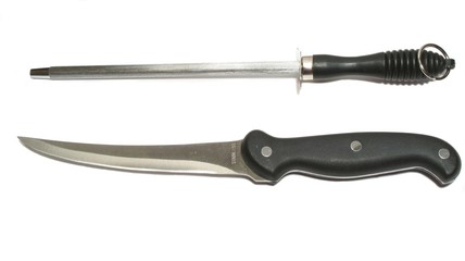 Fillet knife and sharpener on white background.