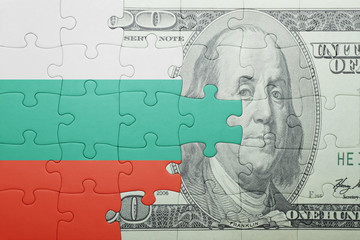 puzzle with the national flag of bulgaria and dollar banknote