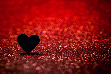 Red heart bokeh background. Valentines day texture.