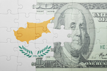 puzzle with the national flag of cyprus and dollar banknote