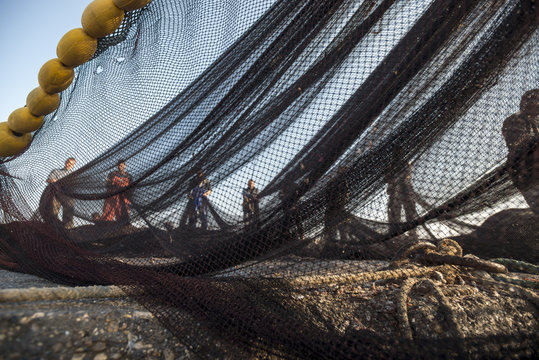 Fototapeta Fishermen on the fishing boat
