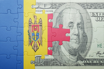 puzzle with the national flag of moldova and dollar banknote