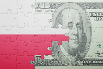 puzzle with the national flag of poland and dollar banknote