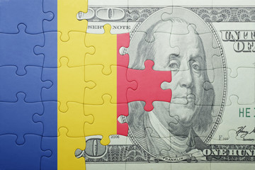 Fototapeta na wymiar puzzle with the national flag of romania and dollar banknote