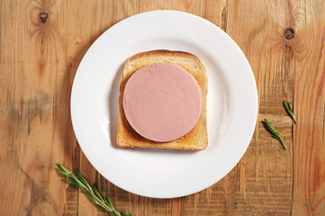Sandwich with grilled bread and sausage