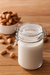 Obraz na płótnie Canvas almond milk organic healthy nut vegan vegetarian drink