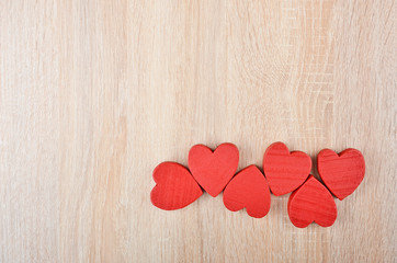 Heart on wooden background