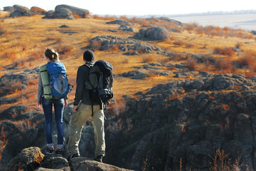 Man and woman on the top of the mountain