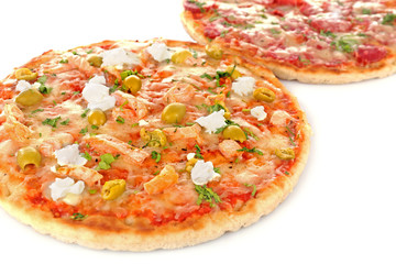 Two delicious tasty pizzas, closeup