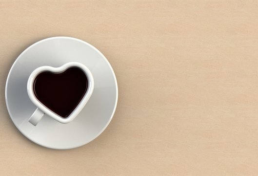 Coffee Cup Shape Heart On Sandstone Table