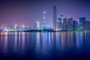 Fototapeta na wymiar Guangzhou, China-Jan.8,2016: Night view of Zhujiang New Town, Guangzhou. Zhujiang New Town is the central business district of Guangzhou which has most of skyscrapers of the city.