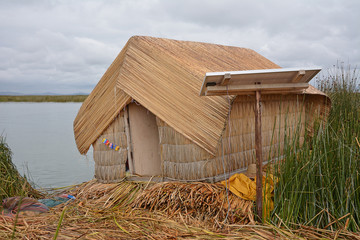Solar Panel on Rural House for Power, Lake Titicaca, Peru.