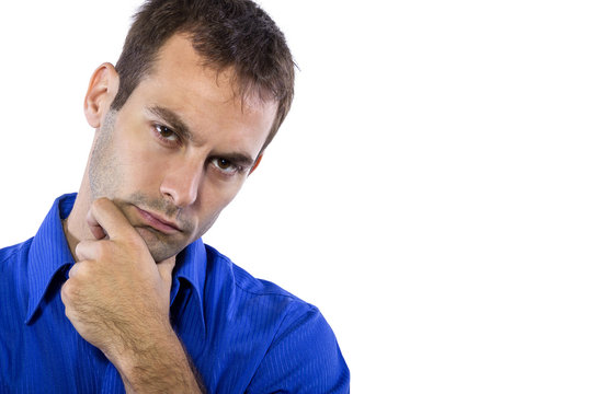 Young businessman in blue collar shirt isolated on a white background contemplating