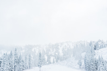 scenic view of small people walking in snow mountain.