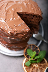 Chocolate pie with fork and ingredients on table
