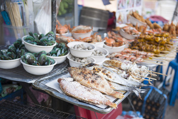 grilled seafood for sale at market