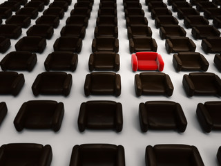 Obraz premium 3d rendering red armchair among black armchairs
