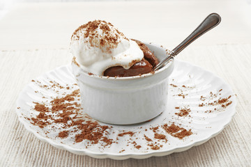 Chocolate lava cake with ice-cream on the table