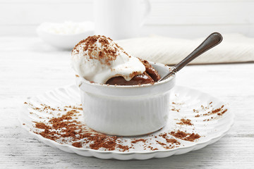 Chocolate lava cake with ice-cream on the table