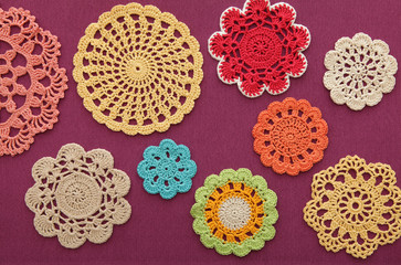 The wonderful colored crochet doilies - obrazy, fototapety, plakaty